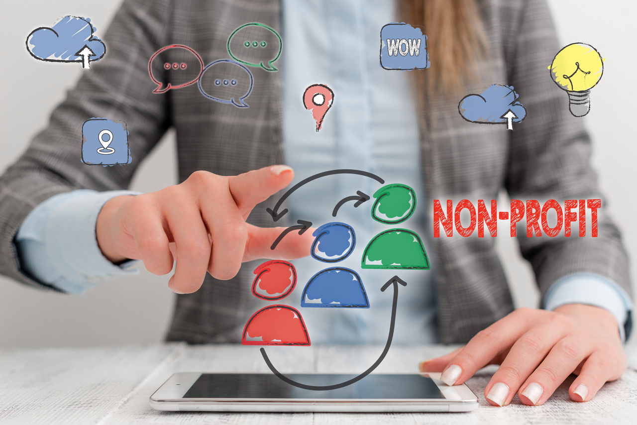 The image is of a woman from the neck down dressed in a blue button up and a blazer jacket with her finger pointed towards whoever is viewing the image. There are several icons in front of the woman including a location pin, a cloud, lightbulb, and icon of a trio, with the word nonprofit skewed right. The webinar is about how non-profits can succeed in the climate after the pandemic. Leadership empowerment, accountability, and trust are all topics that will be covered. The image and webinar relate because they are both about non-profits. image